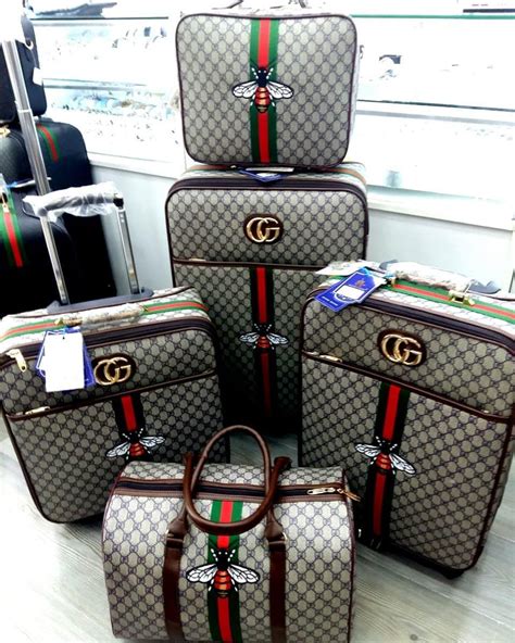 designer luggage sets gucci.